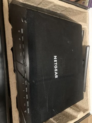 Router módem cable WiFi NETGEAR AC1750 DOCSIS 3.0 incorporado modelo C6300 Foto 1 de 4