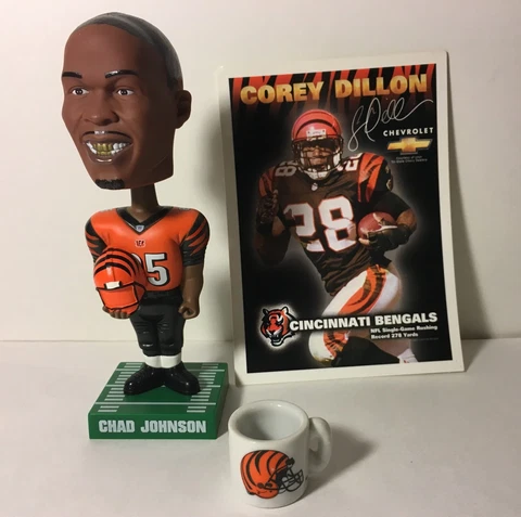 2007 Chad Johnson Bobblehead, 2002 Corey Dillon ad card, 2001 Bengals mini mug Cover