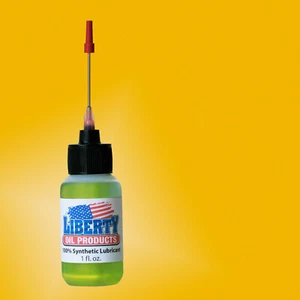 Carrete de pesca de fundición 100 % aceite sintético con aplicador de acero inoxidable - Imagen 1 de 3