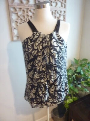 Blusa sin mangas Milly of New York abstracta negra blanca con volantes delanteros de seda talla 6 Foto 1 de 4
