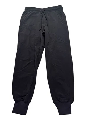 Pantalones de chándal para hombre Alo Yoga cooperativos 7/8 talla pequeña negros de 25" Foto 1 de 4