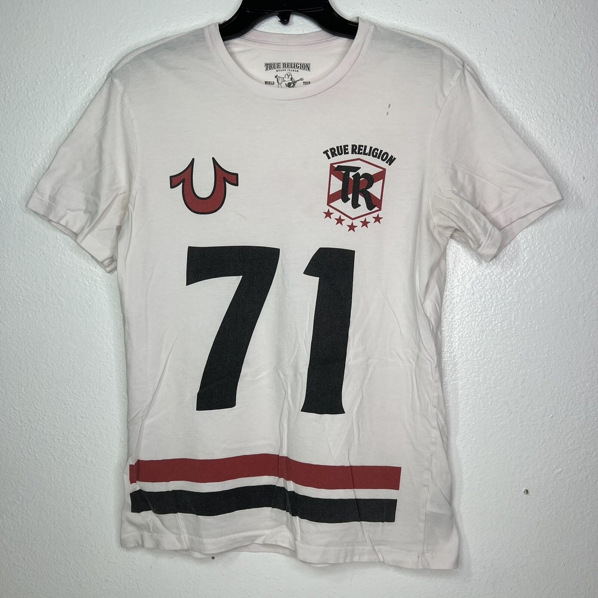 pink and white true religion shirt