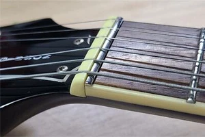 Sintoms Zero Fret - SS - .065"" x 0,104"" - sin Tang - Arc ZF.FRF.NT.SS265164 - Imagen 1 de 5