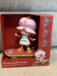 NEW, REMOTE CONTROL SKATEBOARDING STRAWBERRY SHORTCAKE - Picture 1 of 3
