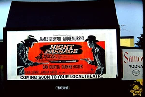 1957 35mm Slide~KODACHROME UNIVERSAL MOVIE NIGHT PASSAGE JIM STEWART BILLBOARD - Picture 1 of 3