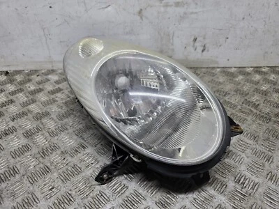 Faro (o/s) Nissan Micra Urbis Mk3 Cc convertible 2 puertas 2005-2007 89900077 Foto 1 de 4