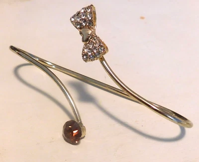 LADIES HAND BRACELET, 1" X 3 1/8", GOLD/RHINESTONES AND TOPAZ - Image 1 of 2