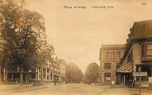 Ashland NH Main Street Storefronts Zigarren Tabak RPPC - Bild 1 von 1
