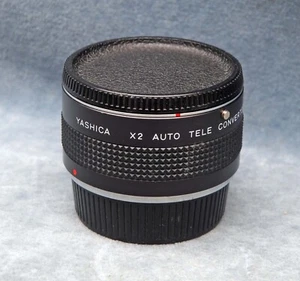 ORIGINALE YASHICA (CONTAX) 2X TELECONVERTITORE AUTOMATICO CON TAPPI - Foto 1 di 3