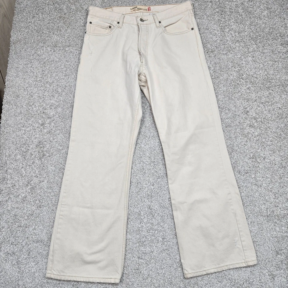 Vintage Levi's 567 Low Loose Boot Cut Jeans Men 34x32 light Beige button fly Y2K - Image 1 of 4
