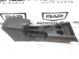 TOYOTA HILUX 06/2015-2025 CENTRE CONSOLE AUTO T/M W/ LID TYPE BLACK - Picture 1 of 7