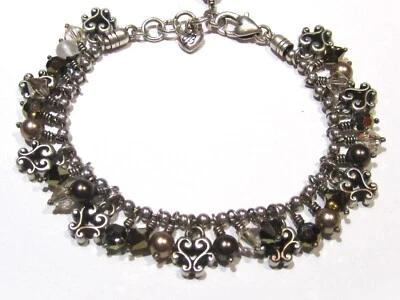 Brazalete Brighton Cannes Topacio Tonos Bronce Plata y Cristal Pergamino Corazón Dije Foto 1 de 4