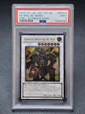 2010 Yugioh STBL-EN043 Karakuri Shogun MDL 00 "Burei" Ultimate Rare 1st Ed PSA 9 - Image 1 of 2