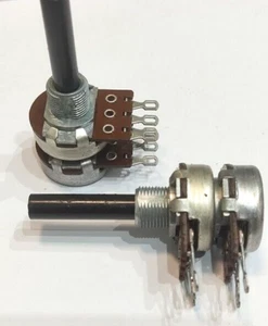 POTENZIOMETRO 100KA LINEARE DOPPIO STEREO ROTATIVO TERM.  OCCHIELLO ( = 2 PEZZI) - Foto 1 di 5