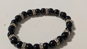Armband Damen modern dehnbar schwarze Kunststeine Glassteine 23 cm Umfang - Bild 1 von 2