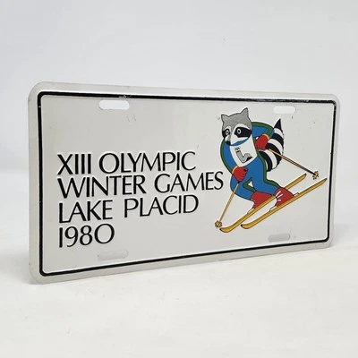 Matrícula olímpica Lake Placid 1980 mascota Roni rara difícil de encontrar usada  Foto 1 de 4