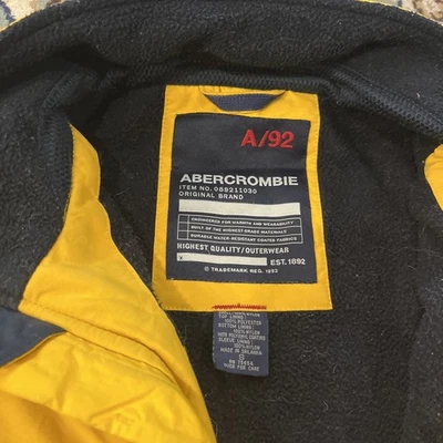 Chaqueta amarilla pequeña vintage Y2K Abercrombie & Fitch A92 para hombre forrada de vellón con cremallera Foto 1 de 4