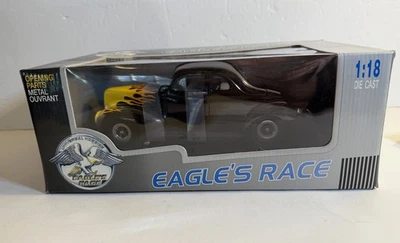 1940 Ford Deluxe Coupe Eagle's Race Universal Hobbies 1:18 Black with Flames - Image 1 of 4