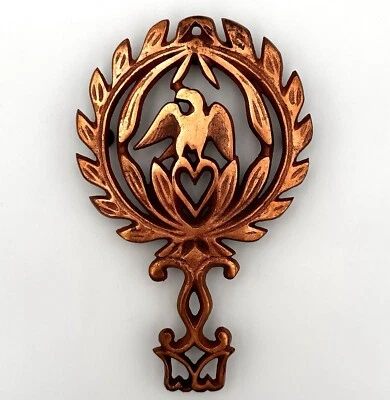 REMACHE DE HIERRO FUNDIDO CHAPADO EN COBRE DE COLECCIÓN FORJADO ÁGUILA CALVA CORAZÓN PATAS Foto 1 de 4