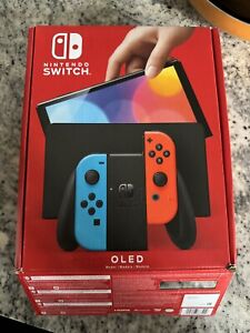 New ListingNintendo Switch OLED with Blue and Red Joy-Con *WITH CHARGER* Tested Good