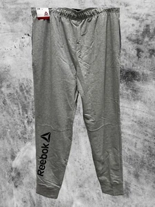 Reebok French Terry Hose grau meliert schmal Reißverschlusstasche Logo am Bein Größe XL - Bild 1 von 4