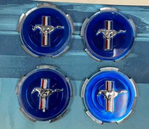 NOS 1967 FORD MUSTANG PONYWHEEL CENTER CAP EMBLEMS SET OF 4 NOS - Picture 1 of 3