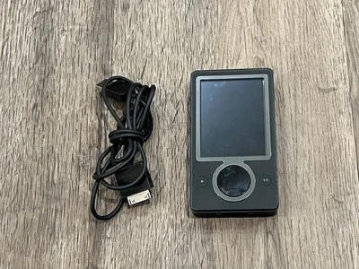 Reproductor multimedia digital Microsoft Zune 30 30 30 GB, negro modelo 1091 funcionando Foto 1 de 4