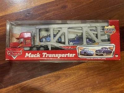 Disney Pixar Cars Mack Truck Transporter with Sally and Doc Hudson NEW - image 1 of 4