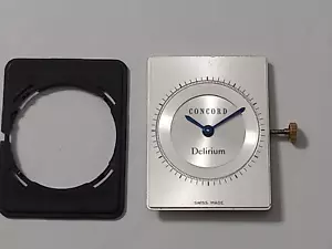 CONCORD DELIRIUM 25.5 X 19.5 MM SILVER DIAL WITH QUARTZ MOVEMENT -MINT CONDITION - Picture 1 of 9