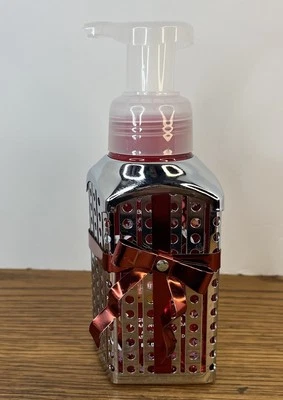 Bath & Body Works Hand Soap Sleeve Holder Silver with a Red Ribbon and Bow - Image 1 of 4