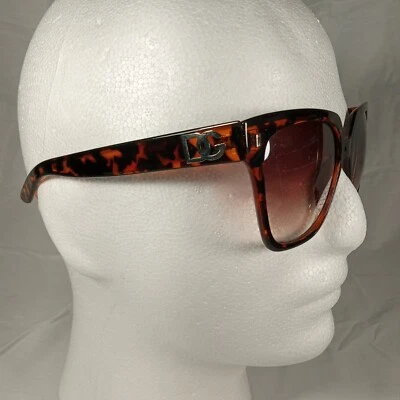 Очки солнцезащитные Dolce & Gabbana DG424 коричневые оранжевые черепаховые овальные с полным ободком очки  - Изображение 1 из 4