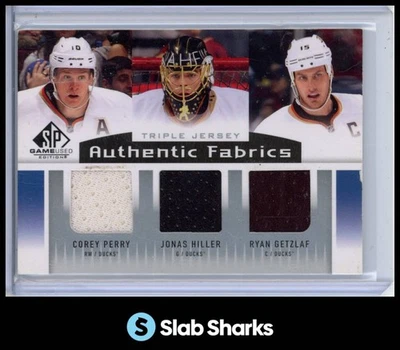 2013 SP GAME USED GETZLAF PERRY HILLER AUTHENTIC FABRICS TRIPLE JERSEYS - Image 1 of 4