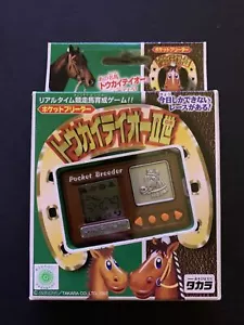 NEW TAKARA Tamagotchi - Tokai Teio Pocket Breeder Horse Race Handheld Game 1997 - Picture 1 of 3