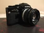 Vintage aparat filmowy Olympus OM10 czarny 35mm SLR Film Camera z obiektywem Zuiko 50mm
