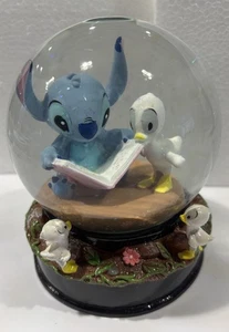 Neu im Karton Disney Stitch Schneekugel Figur Entenküken Lesebuch Lilo & Stitch - Bild 1 von 10