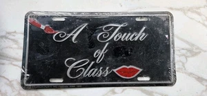 A Touch of Class 1986 Aluminum Vanity Plate Black Vlassic Car Black Embossed NOS - Picture 1 of 5