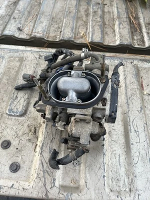 Camioneta pickup Nissan Pathfinder D21 1986-1989 V6 3,0 L carrocería de acelerador duro OEM Foto 1 de 4