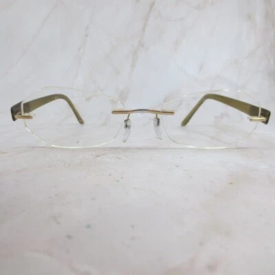 Marco de gafas Silhouette 7608 20 6051 marrón sin montura ovalado 53-17-135 Foto 1 de 4