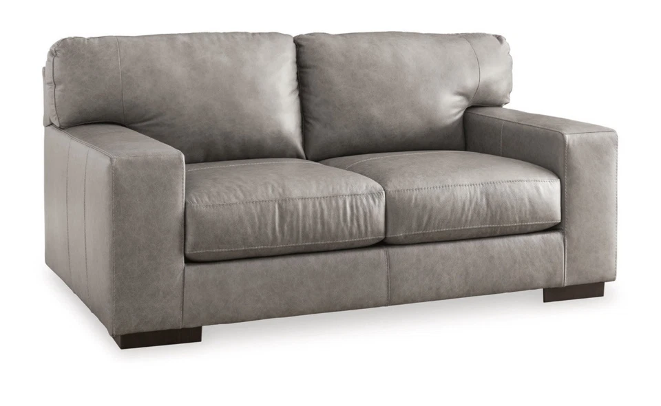 Sofá loveseat Ashley Lombardia moderno de cuero gris con asientos acolchados Foto 1 de 1