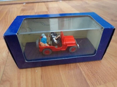 Atlas 1/43 Scala - Tintin Terra Di Nero Oro Willys Jeep Modellino Auto - Immagine 1 di 2