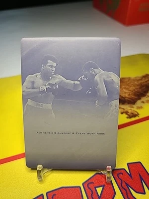2012 Leaf Muhammad Ali The Greatest Event Worn Robe Black Printing Plate 1/1  - Image 1 of 2