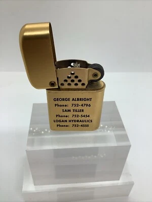 Vintage Storm Master Lighter Logan Hydraulics Logo Gold Never Fired - Image 1 of 4