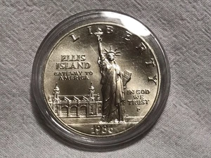 C73 - Coin - 90% Silver - 1986 Ellis Island One Dollar Silver Commemorative  - Picture 1 of 2