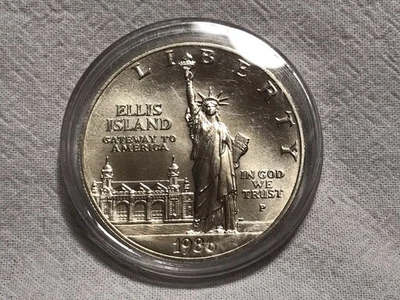 C73 - Coin - 90% Silver - 1986 Ellis Island One Dollar Silver Commemorative  - Image 1 of 2