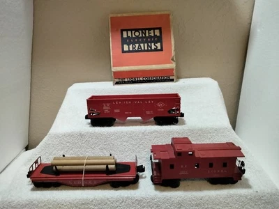 O Gauge Lionel Lehigh Valley # 25000 Hopper (SP) # 2257 Caboose & Log Car # 6111 - Image 1 of 4