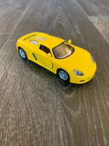 Kinsmart Matte Yellow Porsche Carrera GT Diecast Car 1/36 Scale - Picture 1 of 17