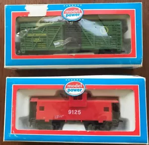 MODEL POWER 8010 - 40' CATTLE CAR GN and 9125 Red Caboose - Picture 1 of 6