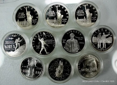 10 COIN  LOT OF PF & UNC U.S. COMMEMORATIVE SILVER DOLLARS $1 1983-2006 CAPSULES - Image 1 of 2