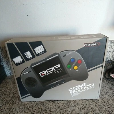 RetroDuo Portable V2.0 Handheld System Portable SNES w/ Adaptor - Image 1 of 4