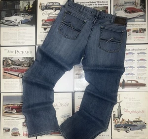 Pantalones de mezclilla Ariat M4 para hombre 38x38 tiro bajo corte bota bigote occidental usados - Imagen 1 de 15